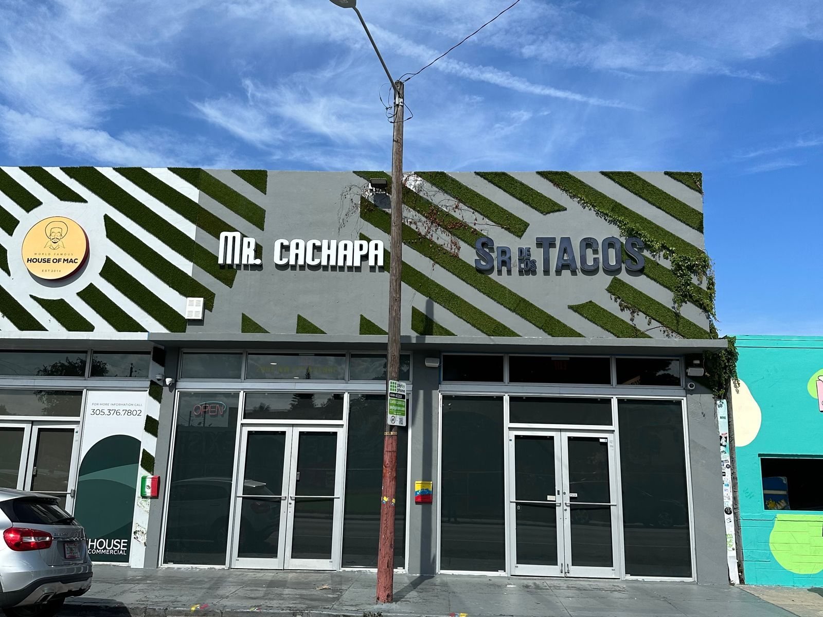 Green and white striped façade of Sr de Los Tacos Wynwood